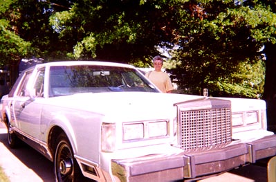 She has a white car.